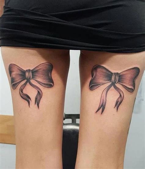 back of leg bow tattoo|More.